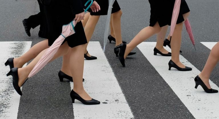 Women in Japan protest against employers' 'flat shoes are bad manners' policy
